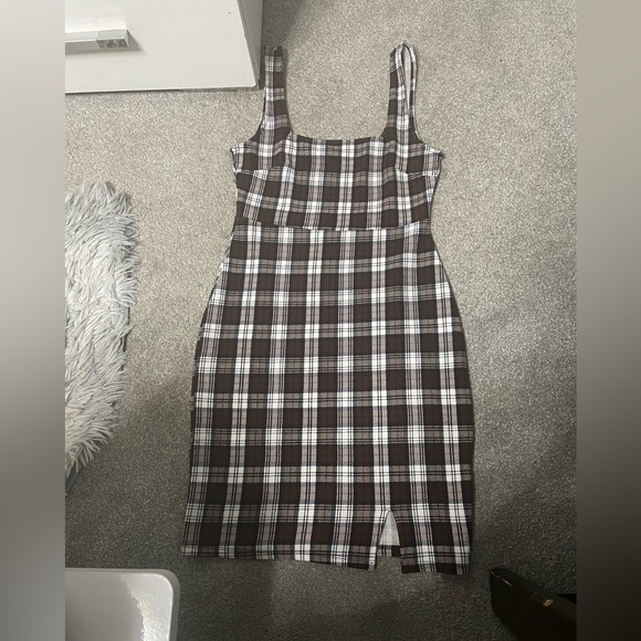 Almost Famous Brown and White Plaid dress with a slit on the side. - Picture 1 of 5